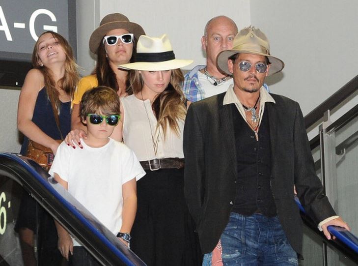 Jack Depp with his dad Johnny Depp and family members